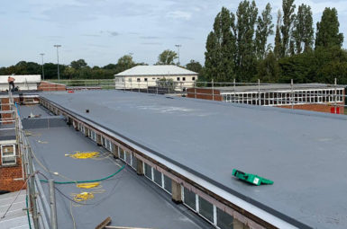 commercial flat roofing project near finishing