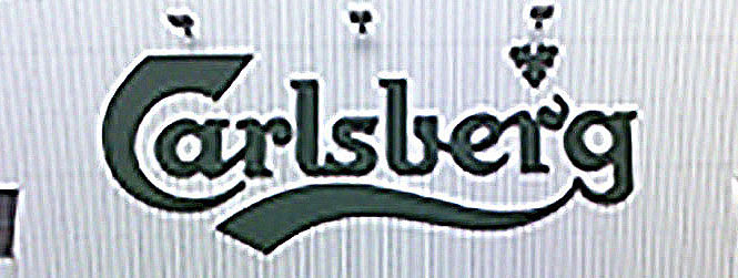 carlsberg logo on face of building